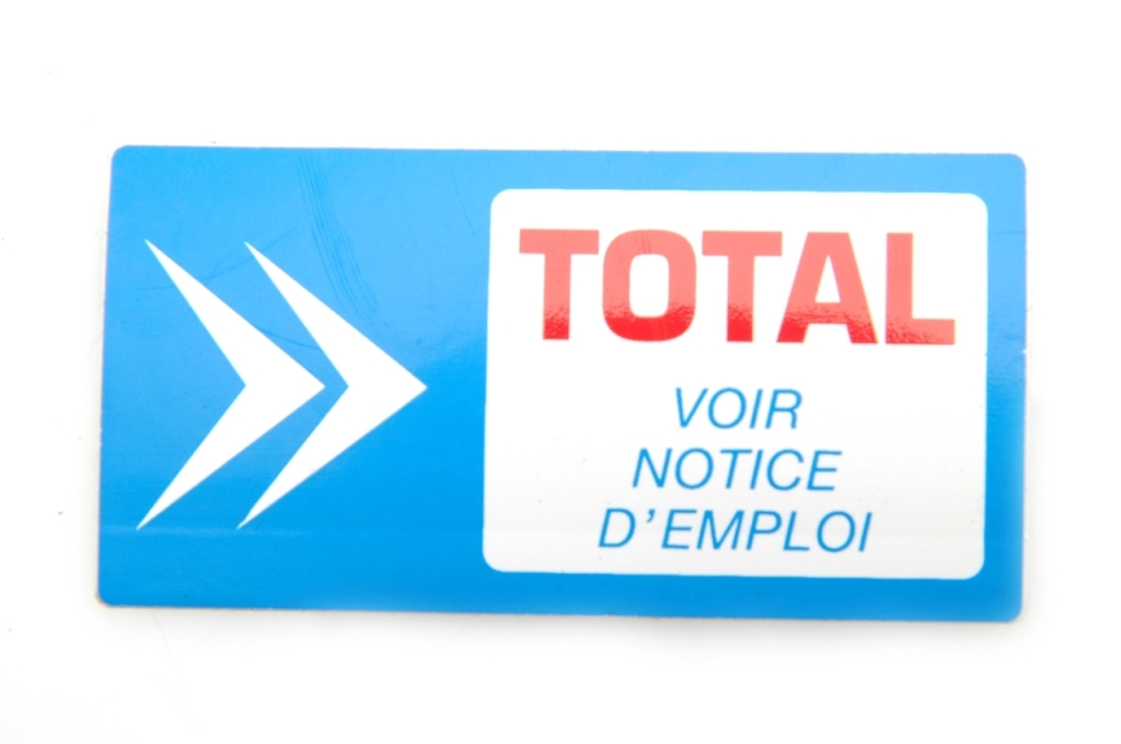 Sticker: blauw (motorolie).