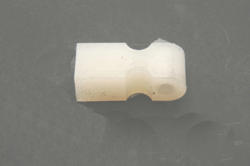 Koplampdempingsrubber.